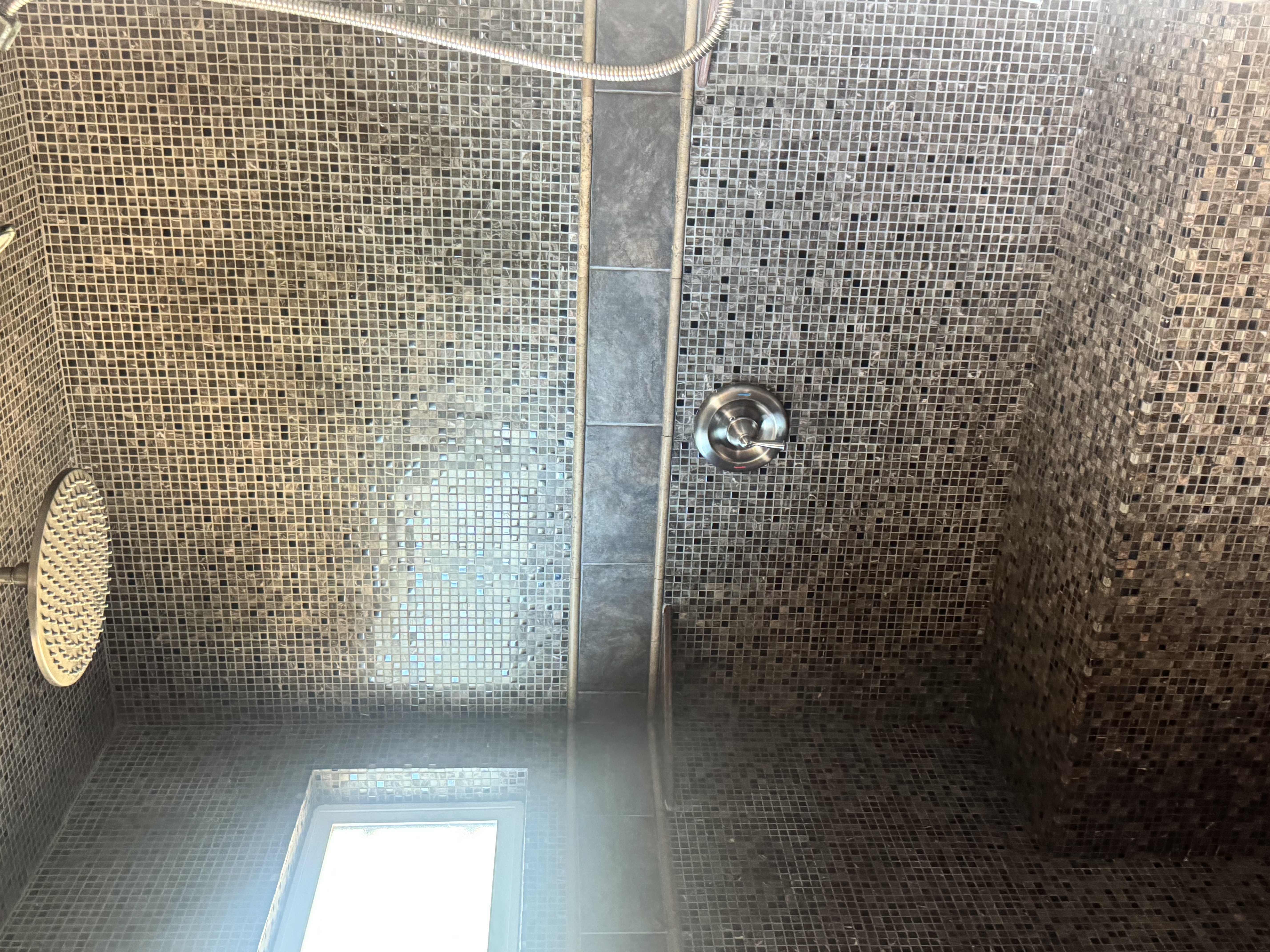 Mosaic tile shower interior detail