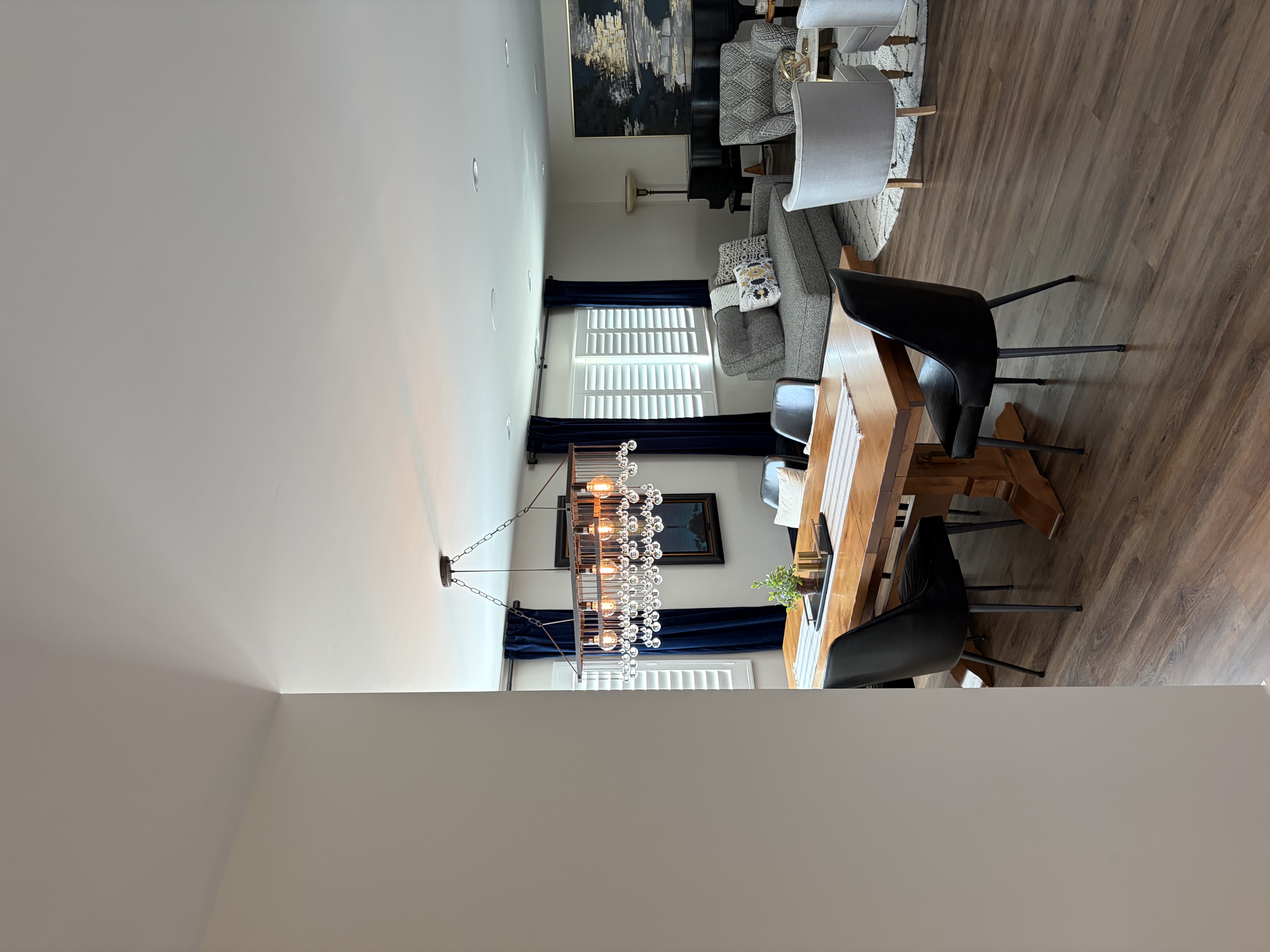 Living and dining room with statement chandelier